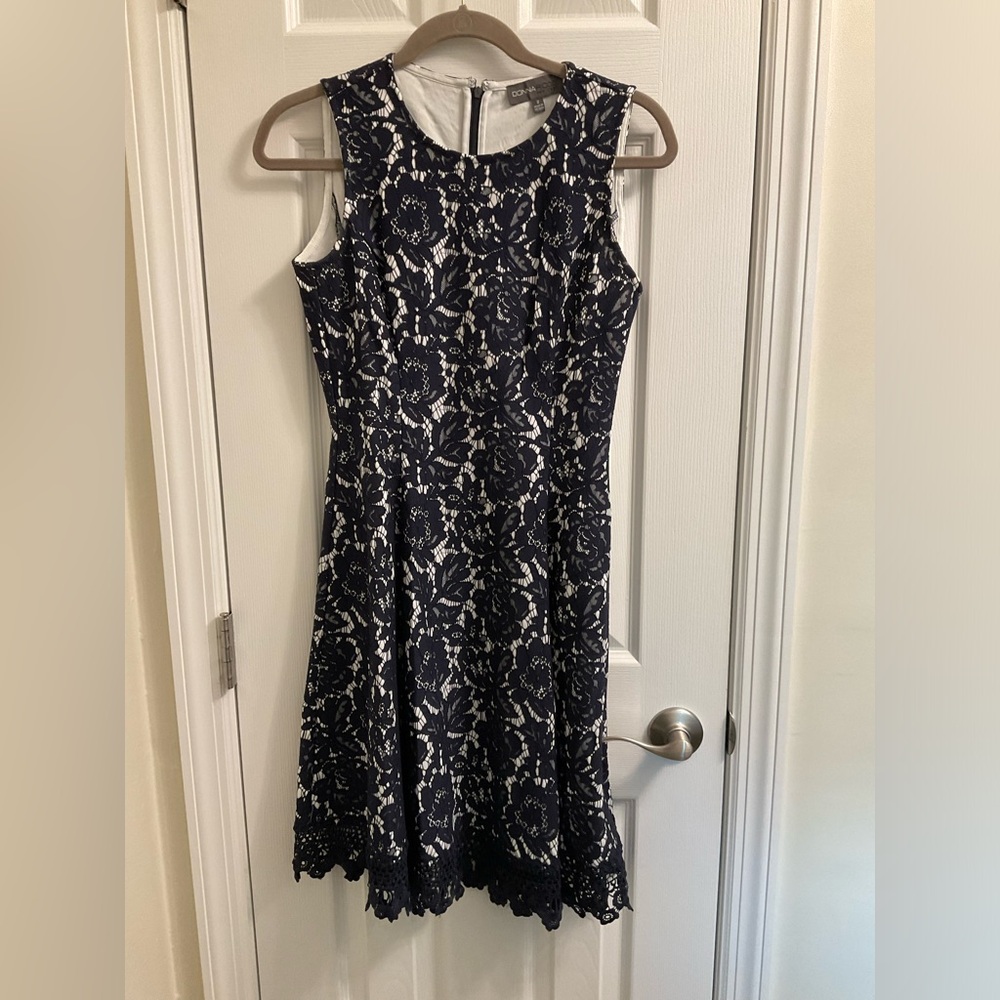 Woman’s size 2 blue and cream color sleeve less dress beautiful lace design
